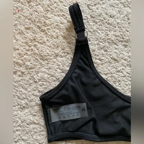 Matte Collection black ribbed one piece cut out bikini. Size XS