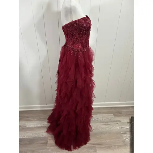 Prom Bay size 6 prom dress in the color wine. Corset with Lace up back & Ruffles Red