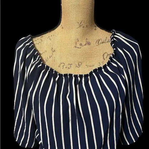Navy and white striped jumper with statement sleeves. EUC Blue Size M