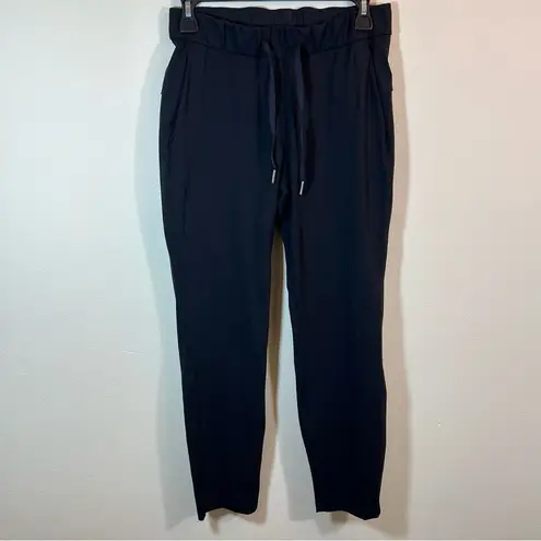 Lululemon  On The Fly Pants 27" Black Cropped Casual Lounge Women’s 4