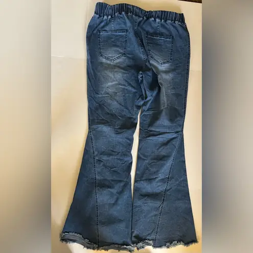 Women’s unbranded flare jeans, stretch fabric, raw hem, size XL, medium wash Blue