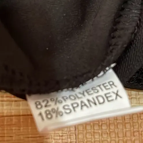 One Piece Women’s black bodysuit size 2XL