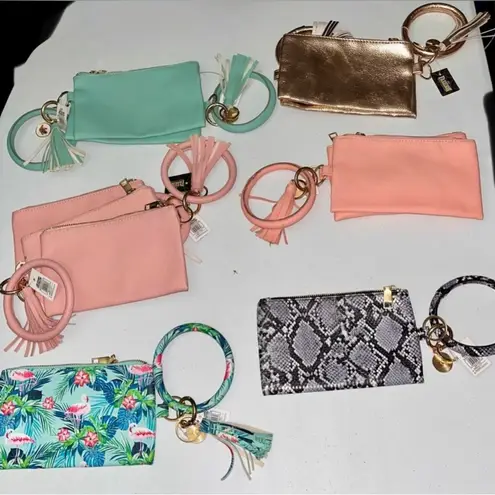 None 💙 NWT Peach Pink Wristlet with Tassel & Charm