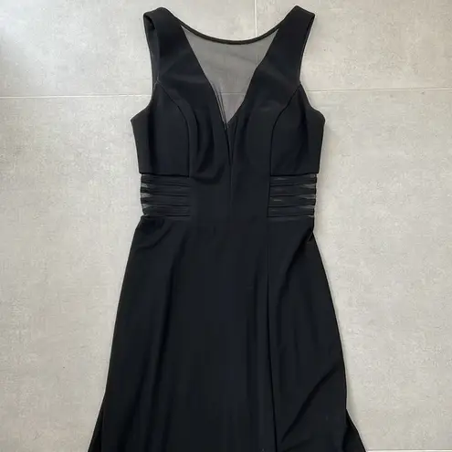 Women size small long black dress with small train bust and waist mesh detail
