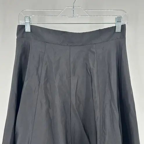 Onyx Nite Onyx a-line black light sheen lil bit of tulle under back zip skirt size M