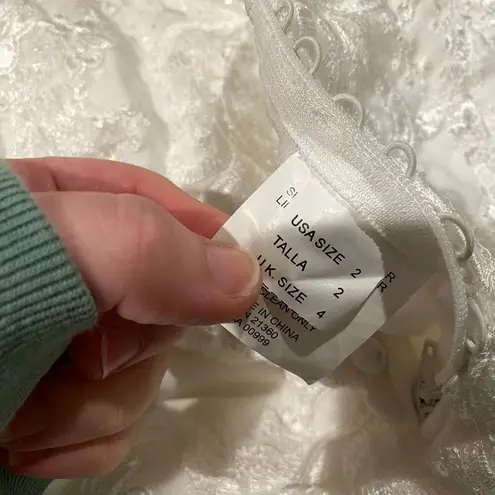 Mori Lee Rasia Sparkle Illusion Wedding Gown with Sleeves in White Size 2