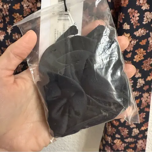 We Wore What Long Sleeve Corset Top in Baby Floral Black Multi
size 6 BNWT