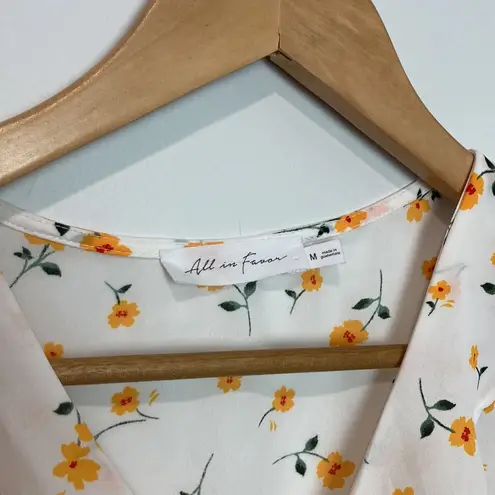 All in Favor | Cream colored Floral Crossover Top sz Med