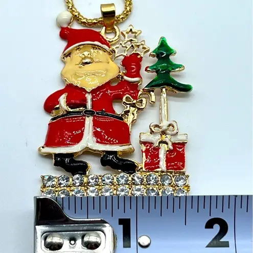 New without tags red and white crystal and enamel Santa Claus Christmas necklace