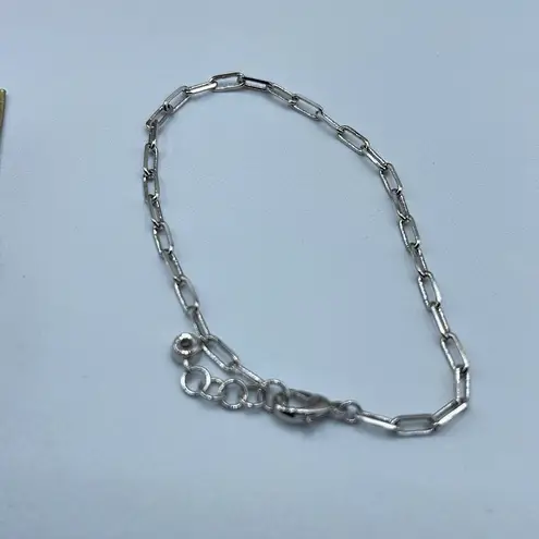 NWT Lucky Charm white gold dipped paper chain bracelet. Silver