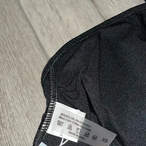 Holipick NWT One Piece High
Neck Criss
Cross Swimsuit Tummy black XS