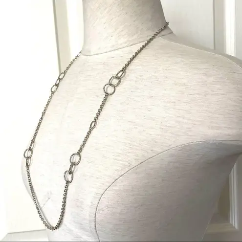 Long silver tone necklace with circles