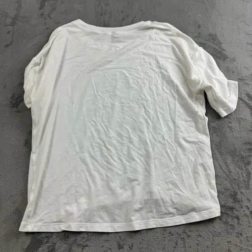 Lululemon  Womens Top Size 8 Short Sleeve White Boxy Athleisure Preppy Logo