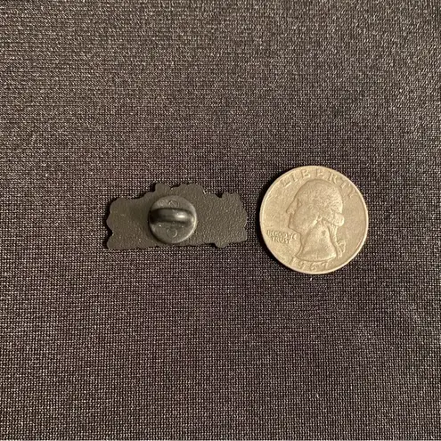 Anyone with an older brother will understand this enamel pin (or magnet). Black