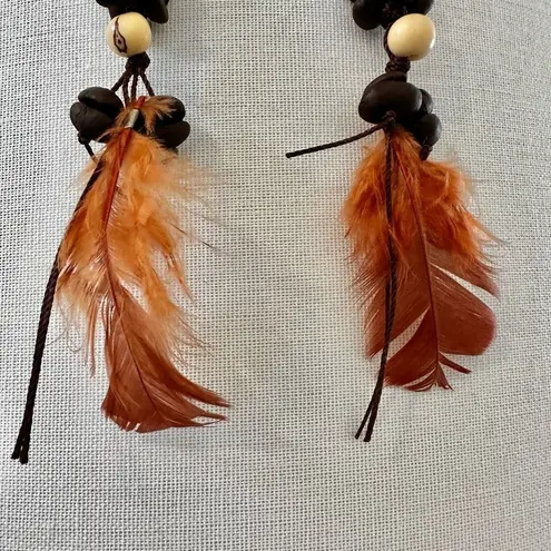 Mexican Coffee Bean shell Extra Long Feather Earrings