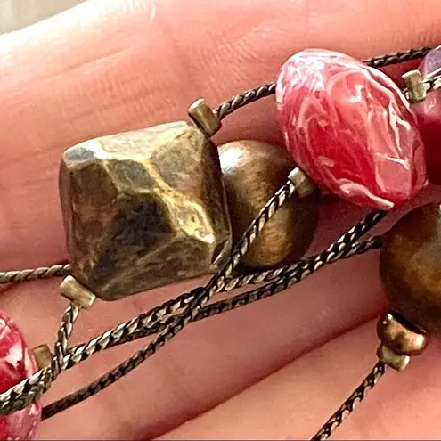 Multi strand floating bead necklace