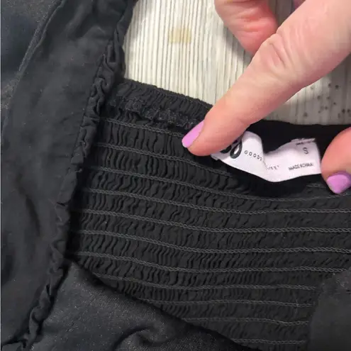 Aerie Black mini A-line dress with ruffle detailing size Small with seer sucker back