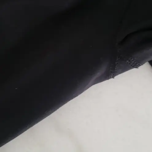 None Black compression capri w zipper back