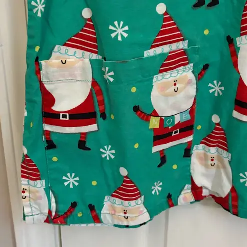 Tafford Uniforms Women’s Santa Print Short Sleeve Scrub Top Green