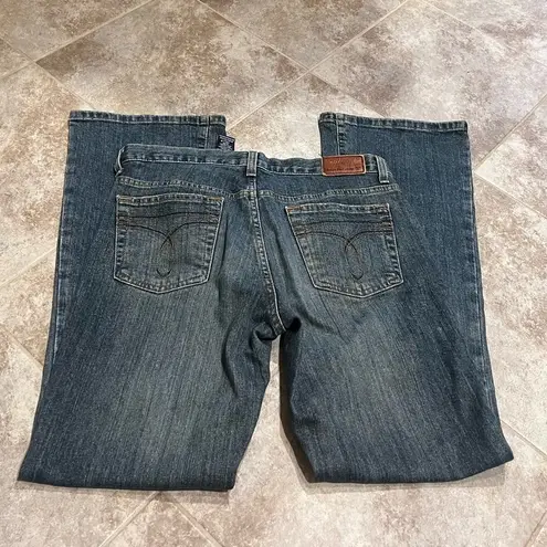 Calvin Klein Jeans Flare Mid Rise Medium Wash Denim Size 2 Blue Stretch