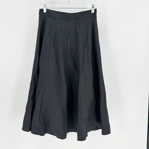 Onyx Nite Onyx a-line black light sheen lil bit of tulle under back zip skirt size M
