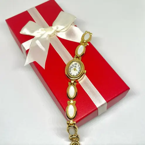 Gold plated dainty vintage style white stone watch
