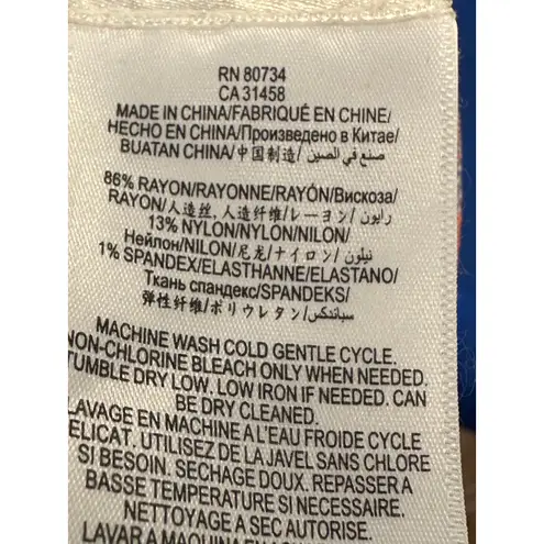 BCBGMAXAZRIA  Katiya Crop Top in an Orange/Blue Geometric Print L