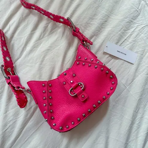 Urban Outfitters hot pink studded shoulder bag.