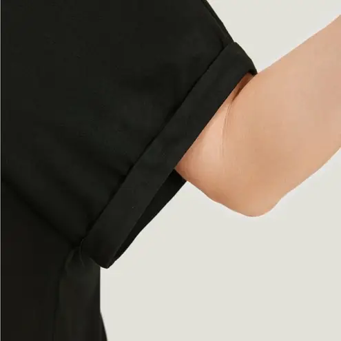 NWT! Black backless Roll sleeve cut out top size 14–16 or 1X