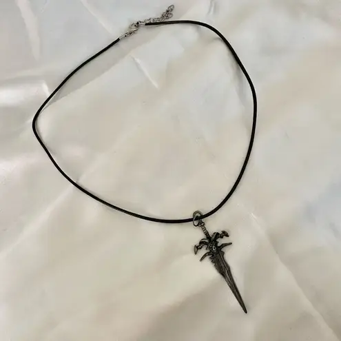 Silver tone sword necklace Gray