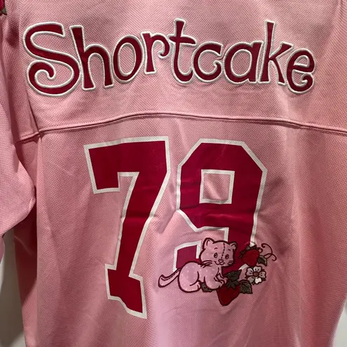 Her Universe Strawberry Shortcake and Custard Cat Women's Cropped Pink Football Jersey