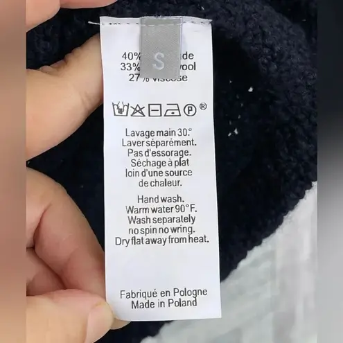 PÔLES MAISON MONTAGUT
OVERSIZED JUMPER WITH LACING SMALL Blue