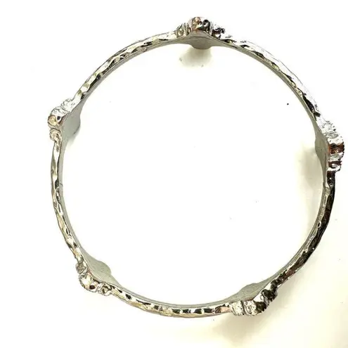 Silver tone clover bangle bracelet