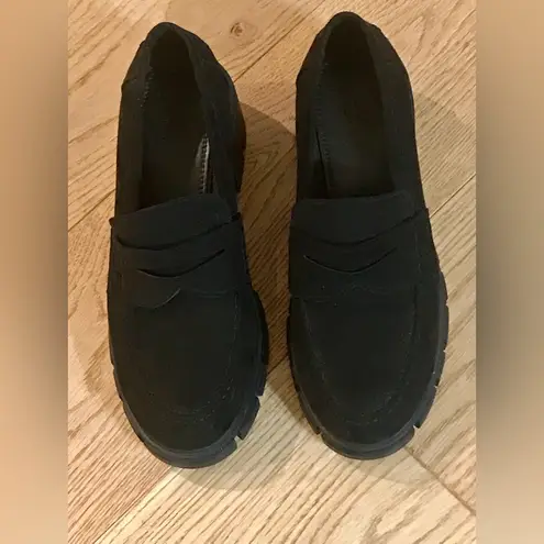 ASOS  DESIGN Storm chunky mid heeled loafers in black suedette