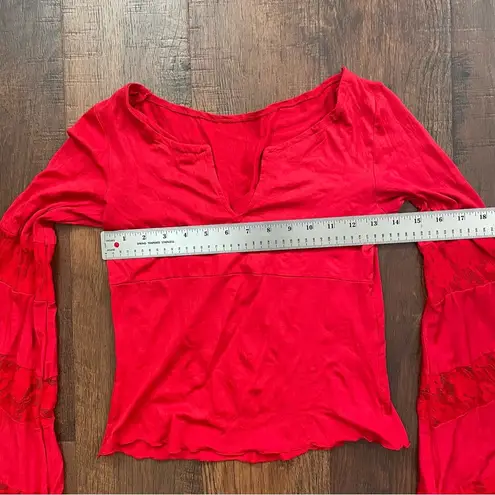LULU red top with bell sleeves, approx size Small