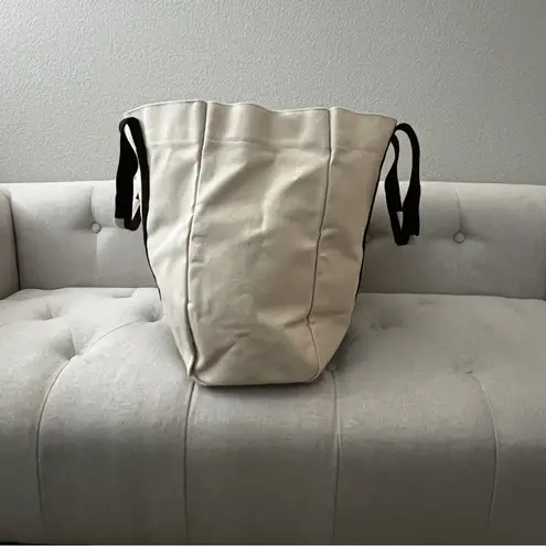 Le Bar Marche NWOT Tote. Limited addition Tan