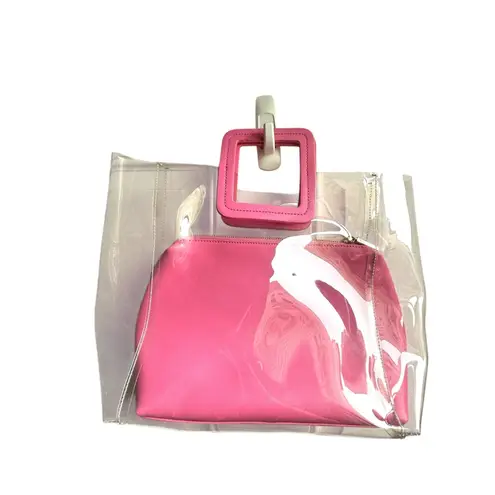 STAUD Shirley Clear Handle PVC Bag Pink