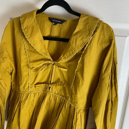 Calligraphie peplum blouse in a mustard yellow/mustard woman’s top Size small Gold