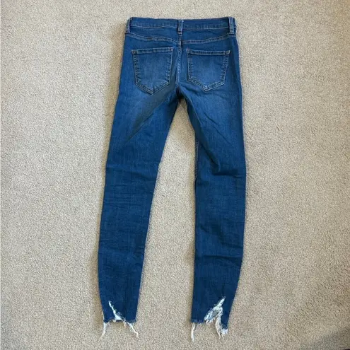 Free People  distressed high rise blue skinny jeans in size 27