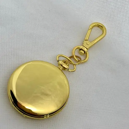 JOY & IMAN Pocket Watch Quartz Clip On Purse Fob Gold Tone white 46mm running