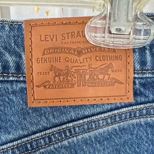 Levi's  70s Inspired High Rise Slim Fit Medium Wash Raw Edge Flare Denim Jeans 28