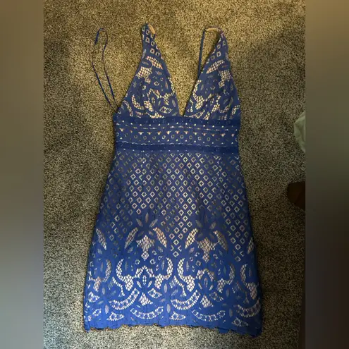 Stylestalker Blue Lani mini dress. Blue lace tan lined deep V spaghetti strap