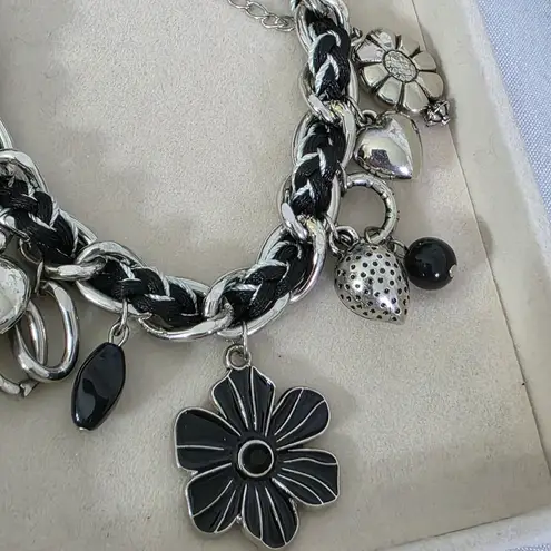 Silver and Black Charm Necklace Mixed Media