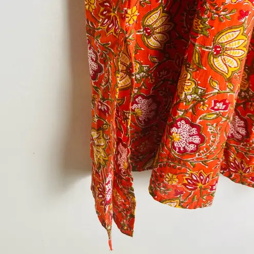dRA Anthropologie orange and floral block print caftan midi dress. Size Small