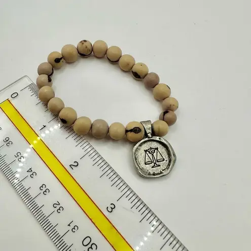 acai seed libra charm bracelet