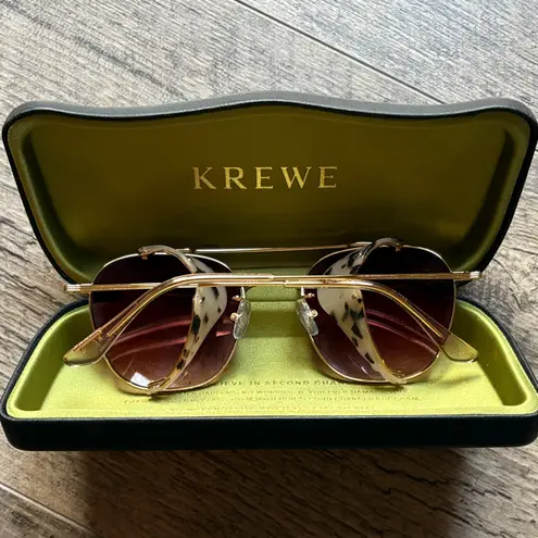Krewe Sunglasses with Gold Frame and Pink Lenses