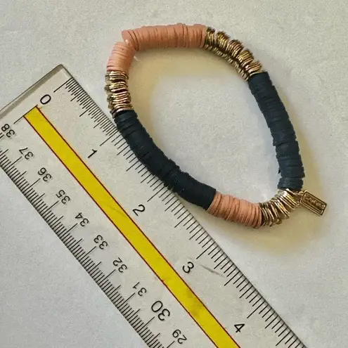 Canvas blue gold tone and peach stretchy clay disc bracelet