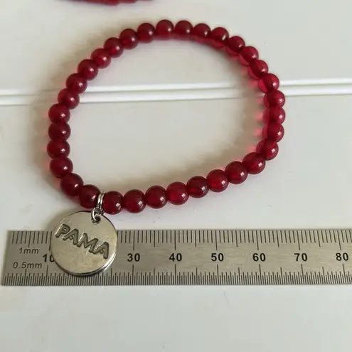 PAMA Pomegranate Liqueur Red Promotional Bracelet Charm is Silver logo Red