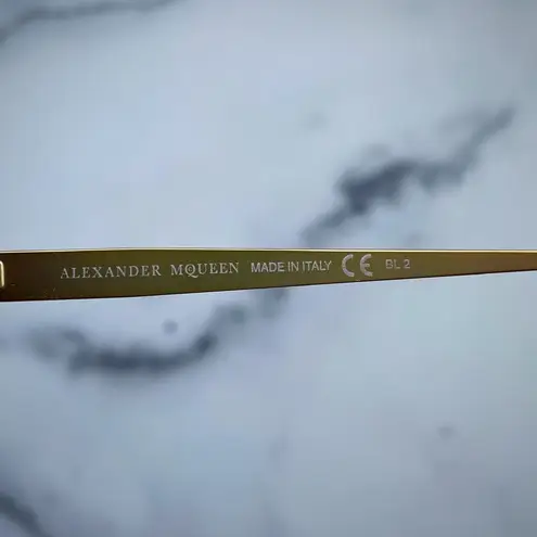 Alexander McQueen women’s AMQ 4241/S tortoise Havana gold cat-eye sunglasses