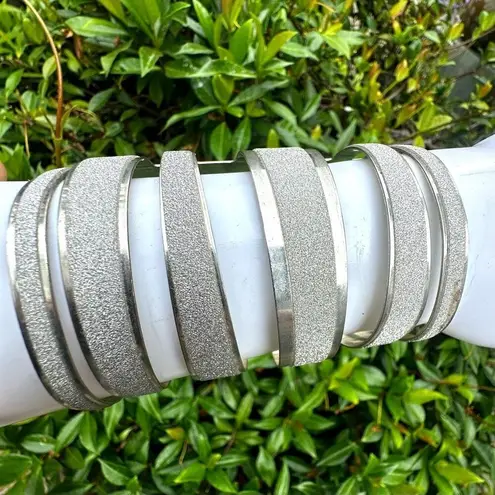 Silver tone glittery long wide arm bracelet